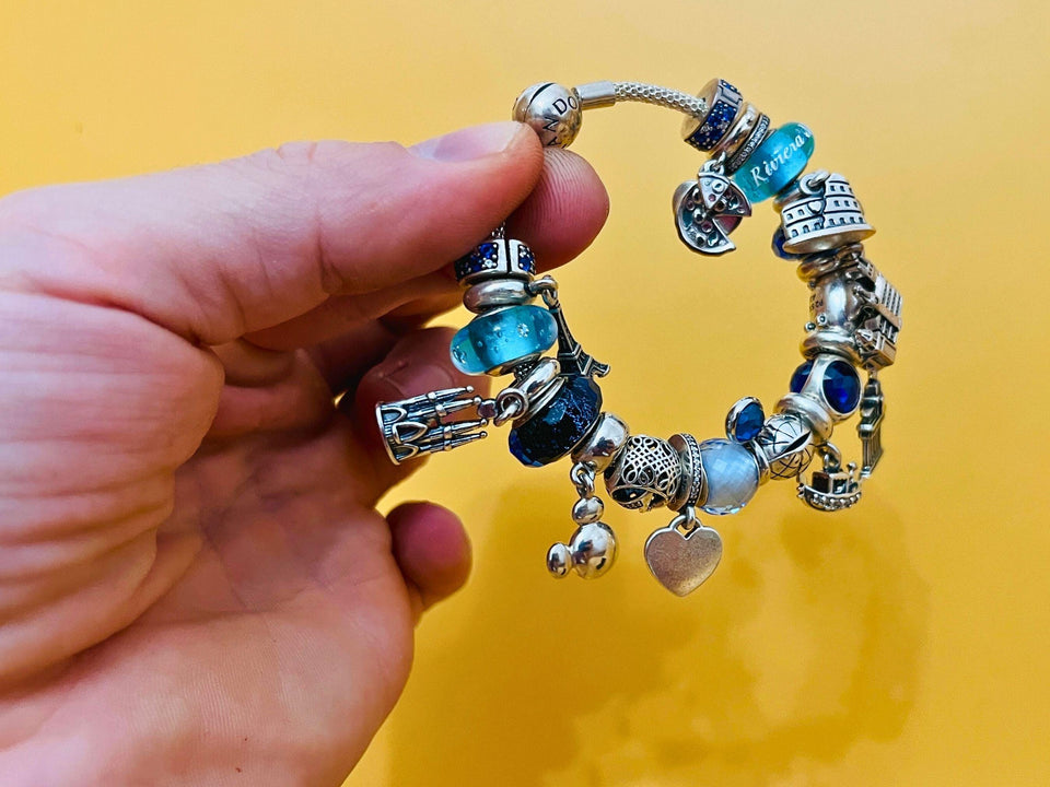 Authentic Pandora Silver Bracelet with 24 Charms - Original Box & Documents Included
