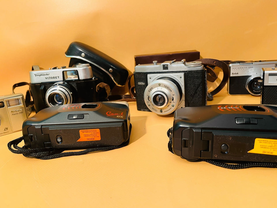 Voigtländer Vitoret and Dacora Digna vintage cameras with original cases