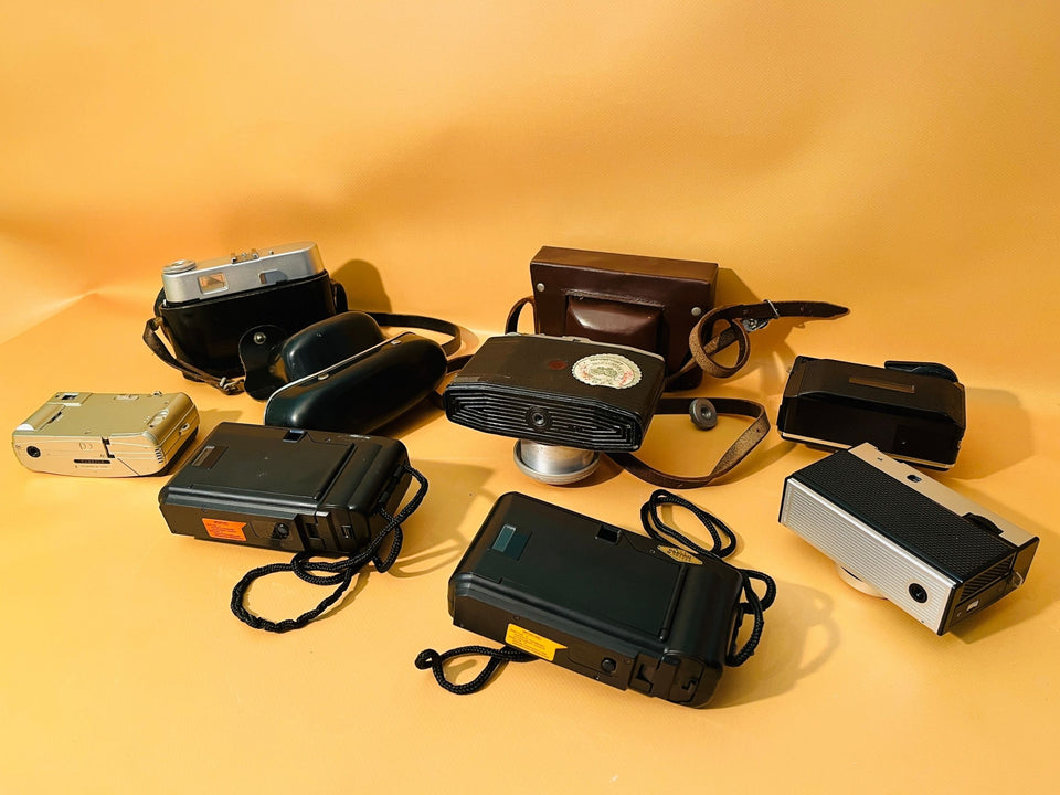 Close-up of Nikon Nuvis 200 and Kodak Instamatic 233 cameras