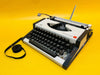 Working Olympia Traveller Deluxe Typewriter with Case | White & Grey | 1970s