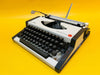 Working Olympia Traveller Deluxe Typewriter with Case | White & Grey | 1970s