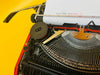 Close-up of the Silverette II branding and the sleek, low-profile red body of this 1970s Japanese typewriter.