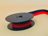 Olivetti typewriter ribbon spool detail black red ink