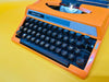Working Orange Silver Reed 100 Typewriter | AZERTY | Case