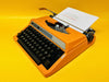 Working Orange Silver Reed 100 Typewriter | AZERTY | Case