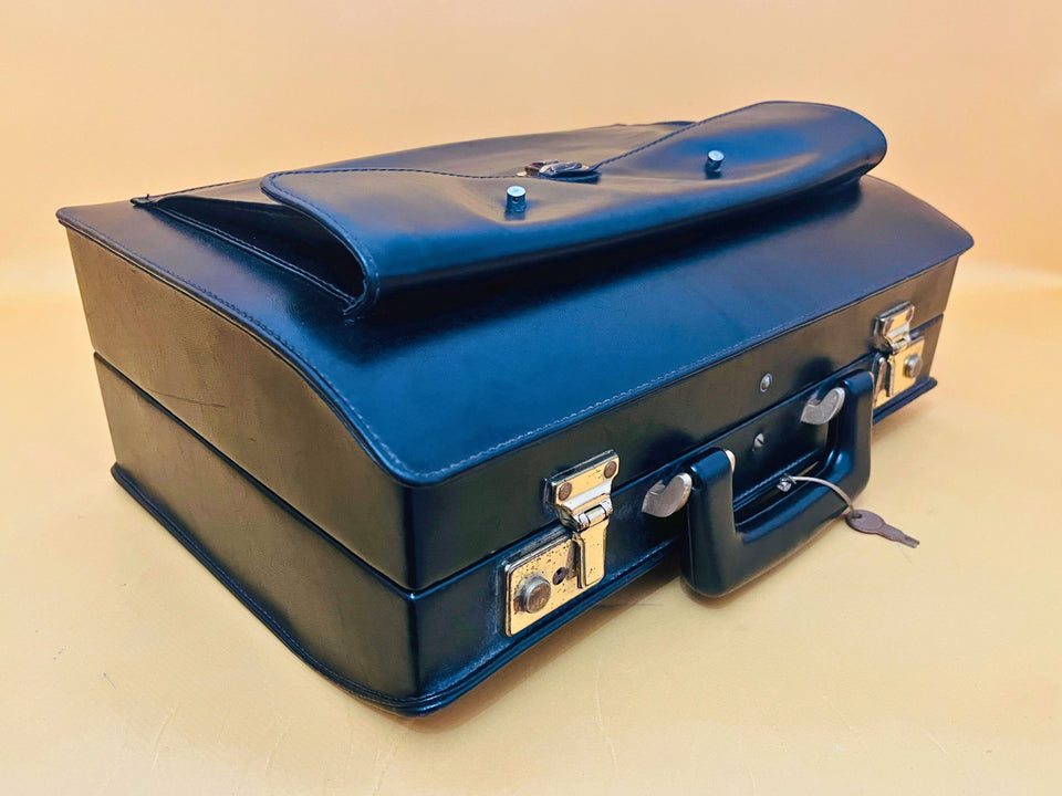 Vintage black leather executive briefcase for work and travel use