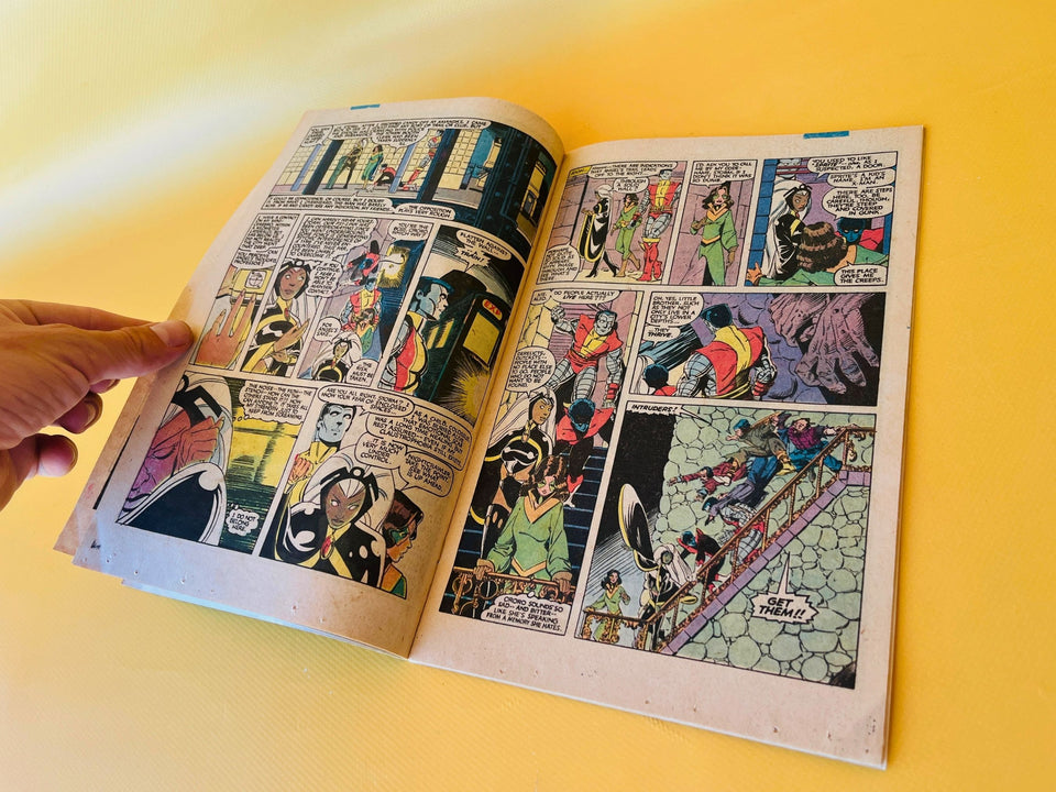 Interior pages of Uncanny X-Men #169 comic book showing classic X-Men artwork from 1983
