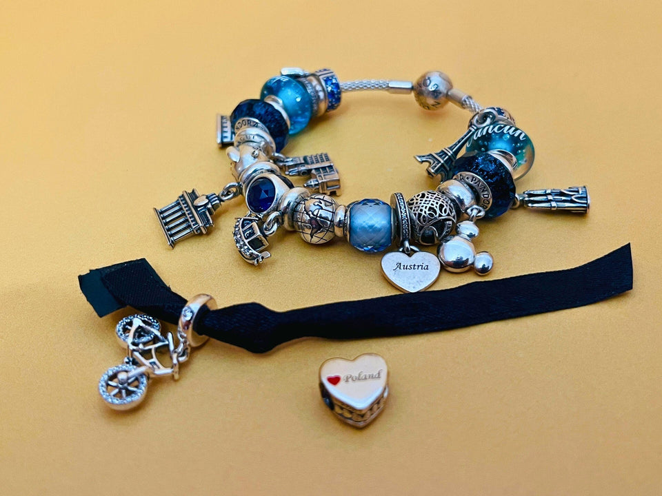 Authentic Pandora Silver Bracelet with 24 Charms - Original Box & Documents Included