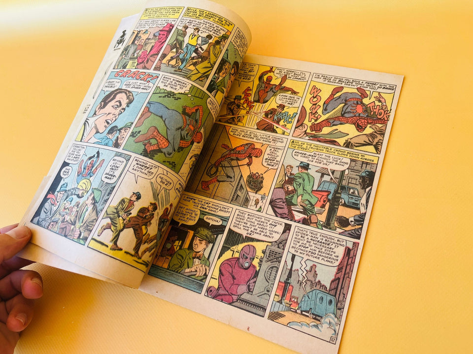 Original interior pages of Amazing Spider-Man #30 showing classic Silver Age Marvel artwork and vintage advertisements from 1965.