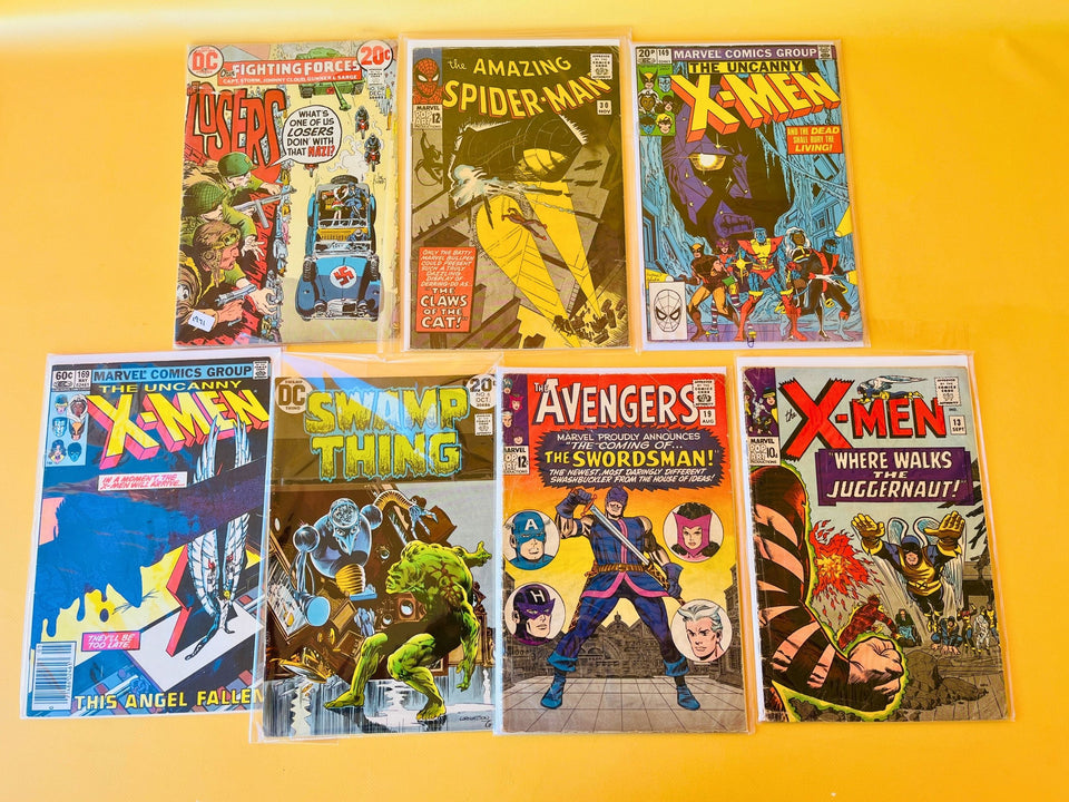 Vintage Marvel and DC comic book collection featuring Amazing Spider-Man #30, X-Men #13, Avengers #19, Swamp Thing #6, and other collectible Silver and Bronze Age comics.