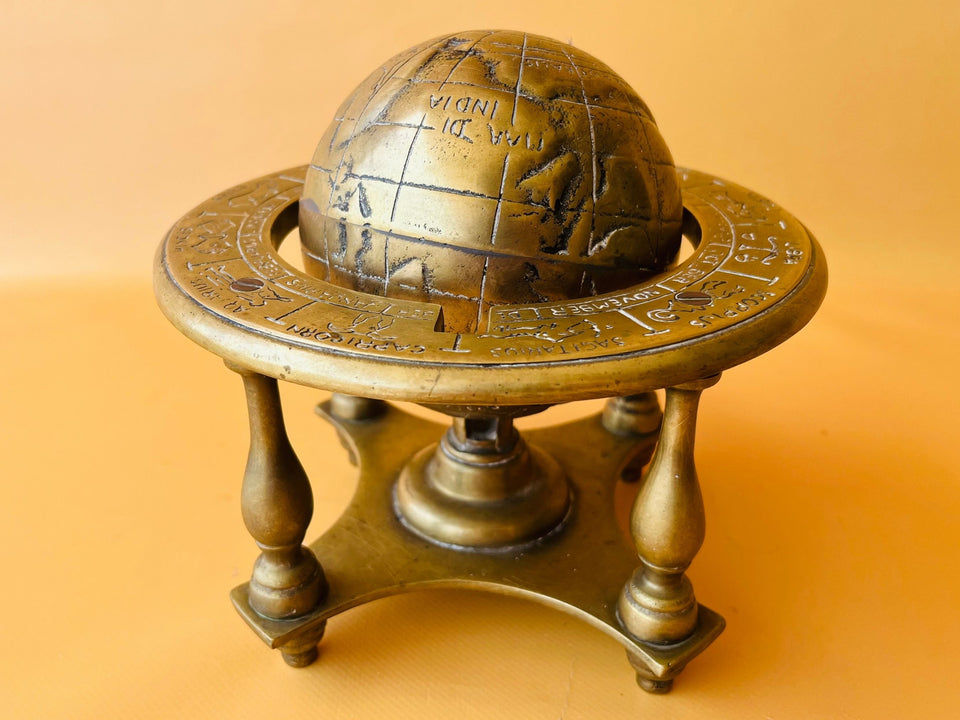 Brass zodiac celestial sphere armillary globe front view