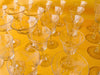 Etched wheat crystal pitcher and glasses close-up detail