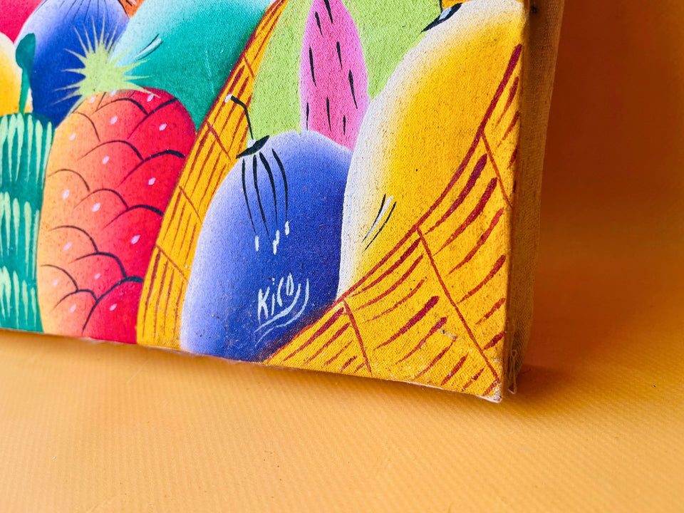 Unframed canvas back showing raw edges of Haitian folk art painting