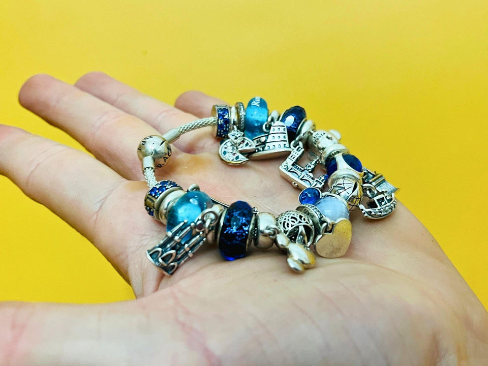 Authentic Pandora Silver Bracelet with 24 Charms - Original Box & Documents Included
