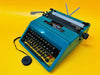 Olivetti studio 45 typewriter in yellow background