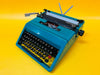 Working Typewriter Olivetti Studio 45 - Blue and Portable - Spanish QWERTY