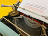 Crisp black and red ink type sample on white paper produced by this vintage Olivetti Lettera 32 typewriter.