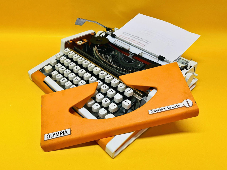 Olympia Traveller De Luxe Typewriter – 1970 Orange Portable Manual Typewriter with Case