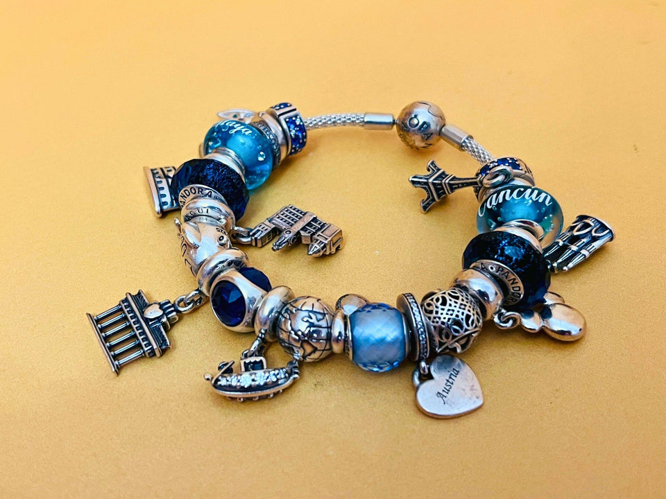 Authentic Pandora Silver Bracelet with 24 Charms - Original Box & Documents Included