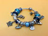 Authentic Pandora Silver Bracelet with 24 Charms - Original Box & Documents Included