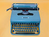 Working typewriter Olivetti Pluma 22 Spanish Qwerty keyboard close-up