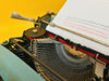 Olivetti Pluma 22 blue with original case, dust sheath, and manual