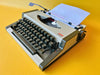 Working Olympia Traveller Deluxe Typewriter | White & Grey | 1970s