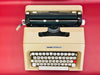 Detailed shot of the Spanish QWERTY keyboard on an Olivetti Lettera 35, showing the crisp keys, Ñ key, and iconic red accent tab button.