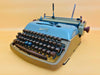 Rheinmetall KST portable typewriter with blue lid QWERTZ