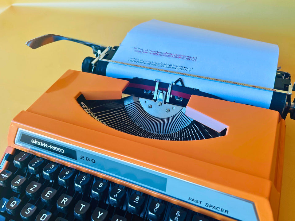 Silver Reed 280 | Safety Orange | The Ultimate 1970s Metal Pop-Art Icon