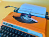 Silver Reed 280 | Safety Orange | The Ultimate 1970s Metal Pop-Art Icon