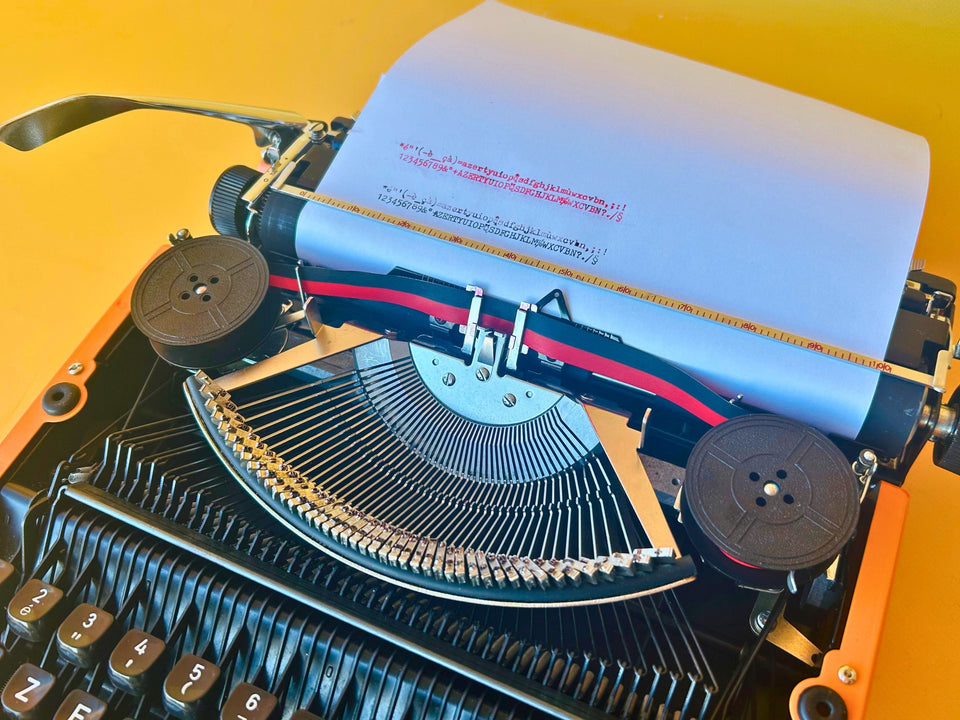 Silver Reed 280 | Safety Orange | The Ultimate 1970s Metal Pop-Art Icon