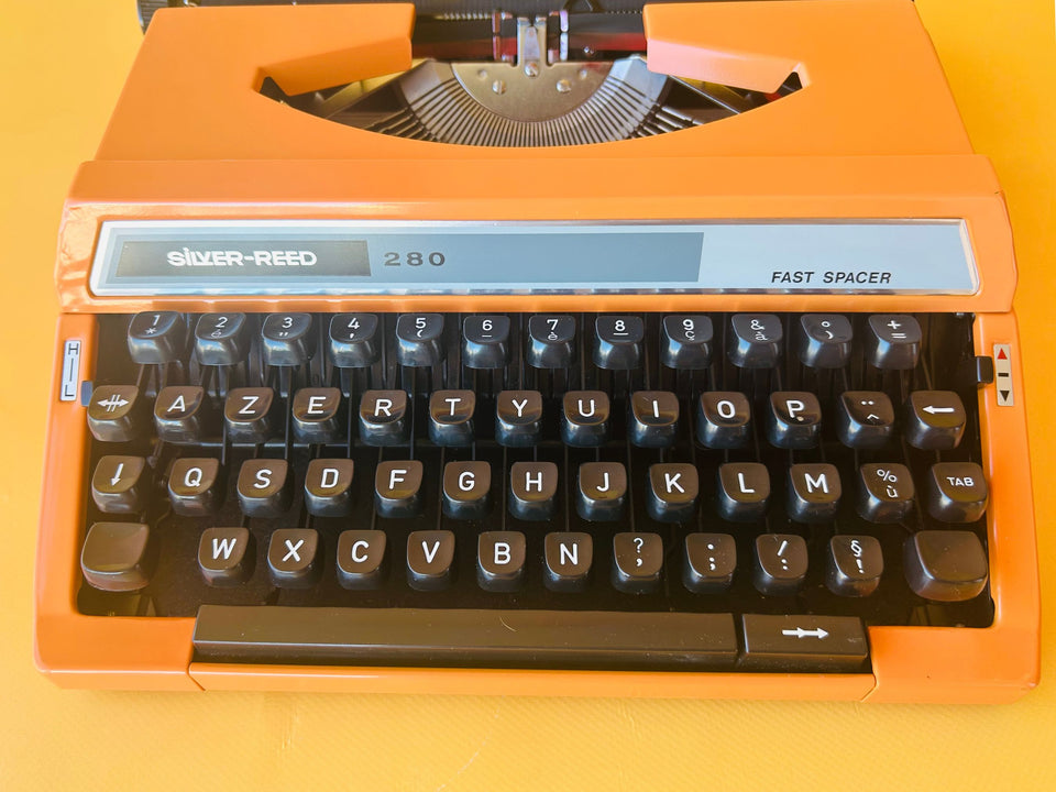 Silver Reed 280 | Safety Orange | The Ultimate 1970s Metal Pop-Art Icon