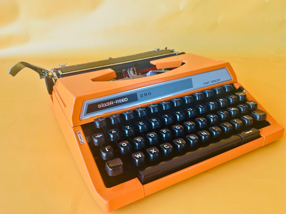 Silver Reed 280 | Safety Orange | The Ultimate 1970s Metal Pop-Art Icon