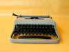 Olivetti Pluma 22 Gray Typewriter - 1970s Manual Portable - Working QWERTY with Case