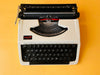 Detailed shot of the black Spanish QWERTY keyboard on a white Vendex 100 showing the Ñ key and crisp white lettering.