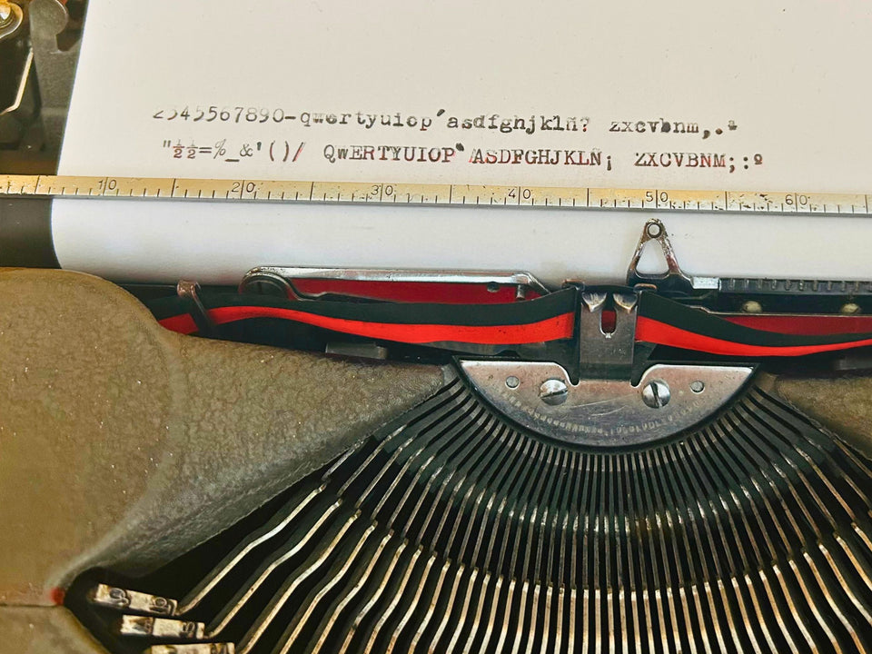 Crisp type sample produced by this professionally revised 1960s Hermes Baby, showing the legendary Swiss precision alignment.