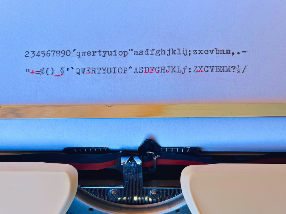 Macro shot of the serial number IX344108 on the frame of this professionally revised Remington Idool 2 typewriter layout
