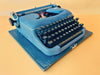 Erika Model 100 Typewriter | German Portable Manual Typewriter with Case & Original Brushes | Spanish QWERTY | Made in Germany