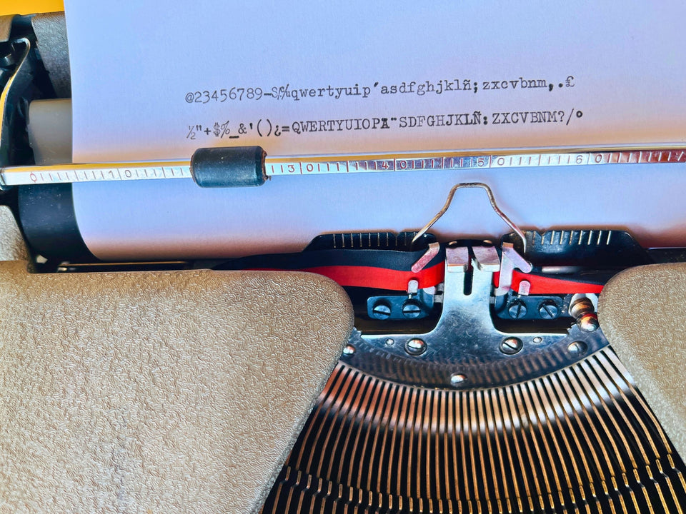 Working Erika Model 100 typewriter from Germany with Spanish keyboard layout and carrying case