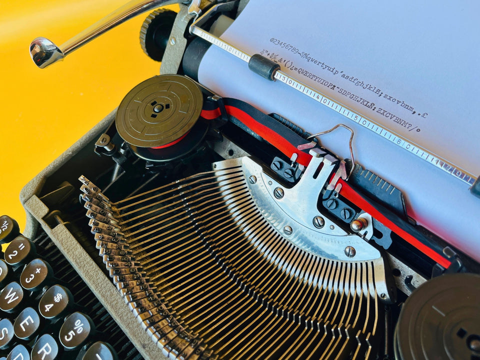 Erika Model 100 Typewriter | German Portable Manual Typewriter with Case & Original Brushes | Spanish QWERTY | Made in Germany