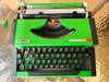 Olympia traveller deluxe green typewriter close up