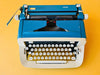 Vintage Imperial Safari manual typewriter in blue color fully working