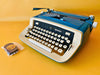 Imperial Safari Typewriter | Blue & White Portable Manual Typewriter | Spanish QWERTY | Serial S49 056912