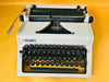 Vintage Erika Mod 100 manual typewriter made in GDR with black keys and black leather case