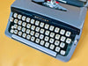 Working Brother Deluxe Typewriter | Blue Portable Manual Typewriter with Case | AZERTY