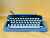 Working Brother Deluxe Typewriter | Blue Portable Manual Typewriter with Case | AZERTY
