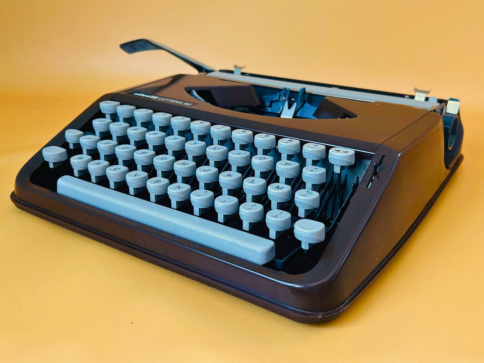 Brown Olivetti Lettera 82 portable typewriter made by Olivetti do Brasil with QZERTY keyboard