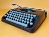 Brown Olivetti Lettera 82 portable typewriter made by Olivetti do Brasil with QZERTY keyboard
