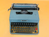 Close-up of Olivetti Lettera 32 AZERTY keyboard showing original keys and typing mechanism